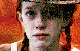 Anne, in the moment that she's learned that the Cuthberts asked for a boy, and she's shattered, with a tear running down her face.