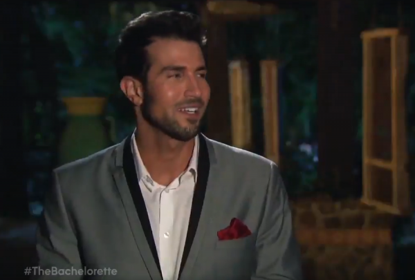 A still shot of Brian looking off to one side.