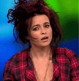 Helena Bonham Carter blinking at the screen confused 