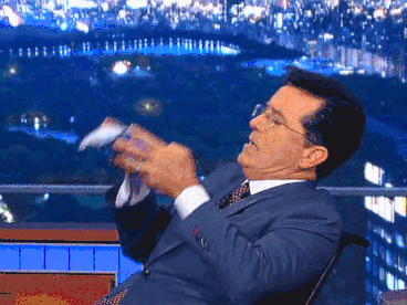Stephen Colbert shoving Oreos into his mouth