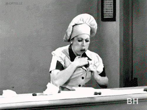 Lucille Ball devouring chocolate from a conveyor belt