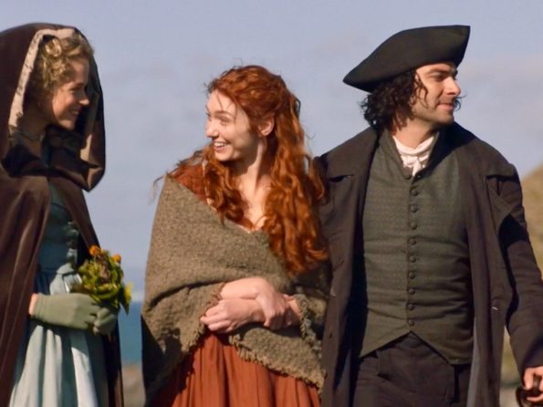 Caro, Demezla, and Ross. Demelza is grinning at Caroline, because no one is as happy for her friends as Demelza Poldark