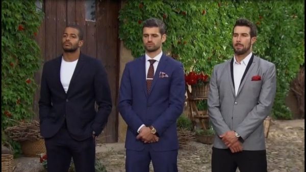 Eric, Peter, and Bryan stand next to each other, waiting for Rachel to give out the last two roses.