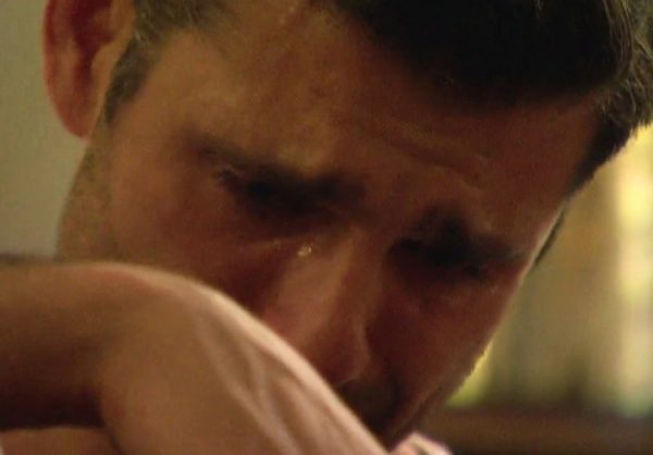 A close up of Peter in tears.