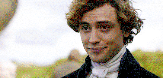 Hugh, fluffy of hair, giving Ross and D a sad partial smile. He looks like trouble brewing on the horizon.