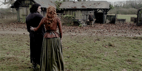 Ross and D, facing the smithy, putting their arms around each other. Adorbs