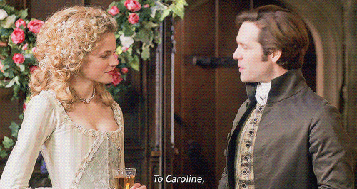 Enys, toasting Caroline.