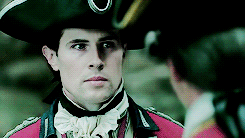 Grey, looking at Jamie.