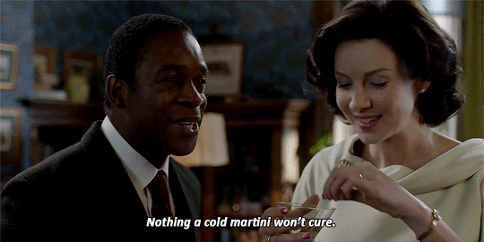 Joe handing Claire a drink and saying, Nothing a cold martini won't cure.