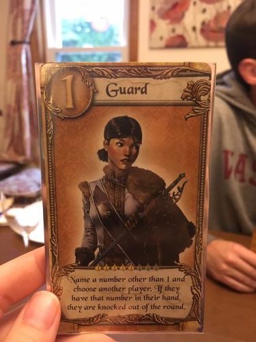 The Guard card, where a player chooses a number other than one. If a selected player has that numbered card, they are knocked out of the round.