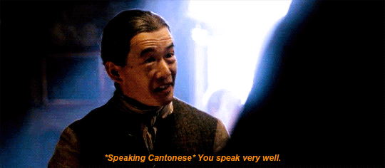 Yi Tien Cho, smiling at Claire, and telling her, in Chinese (Mandarin, I think?) that she speaks very well.