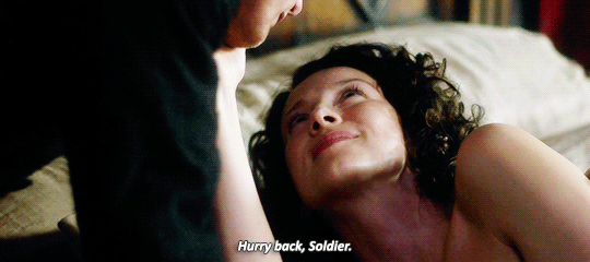 Claire, in bed, sending a fully clothed Jamie on his way, telling him to Hurry back, soldier.