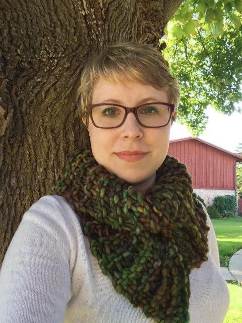 A picture of me, modeling an Outlandish cowl. I'm outside standing by a tree.