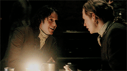 Fergus and Young Ian, at a table, being brothers.