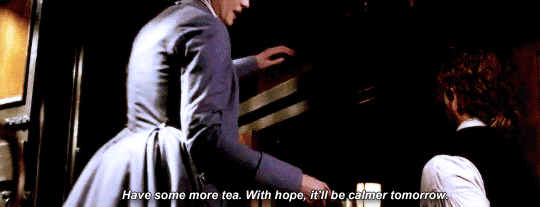 Claire handing Jamie some ginger tea and saying that she hopes it'll be calmer tomorrow.
