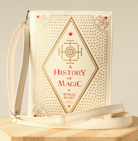 A History of Magic purse in ivory leather with red accents
