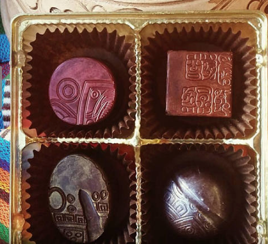 Chocolates stamped with swirls and designs
