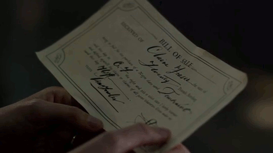 Claire, holding the Bill of Sale for Temeraire.