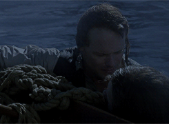 Claire and Jamie, clinging the floatsam like Jack and Rose.