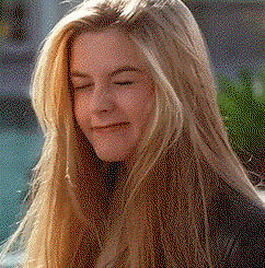 Alicia Silverstone squints and shrugs like she's thinking she just heard some BS