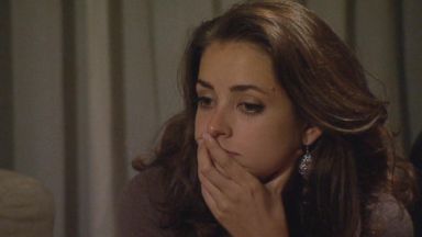 Jacqueline contemplates her future with Arie. Her expression is pensive and not excited in the least.