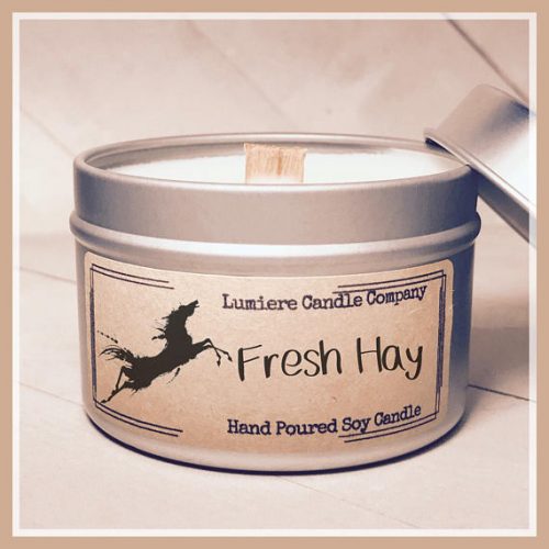 A metal tin with a tan label that features the shape of a horse.