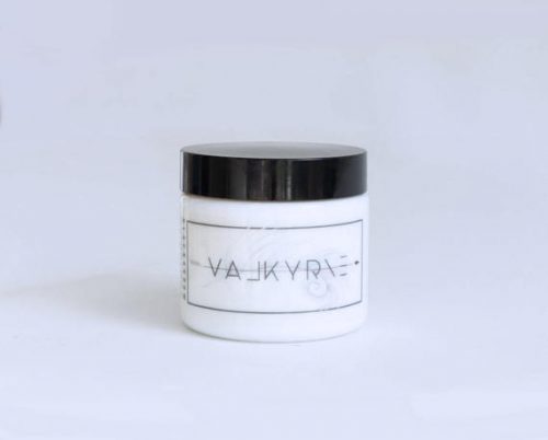 Black Arrow Candles Valkyrie scent. A jar with a marbled label and a black lid.