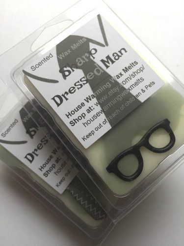 House Warming Wax Melts - Sharp Dressed Man. A white and black wax melt decorated with cute wax ties and glasses.