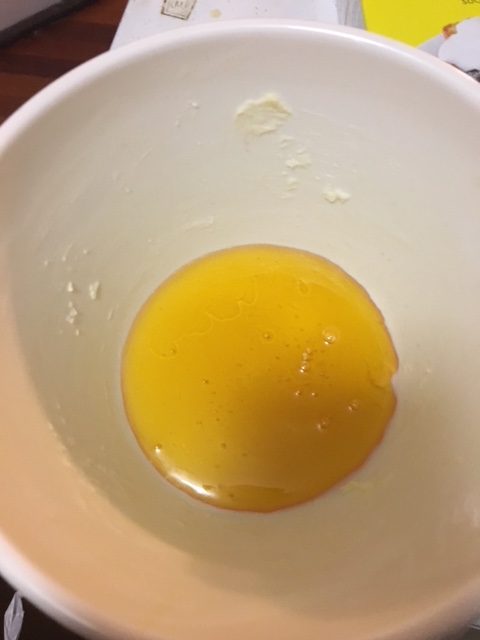 Golden syrup in the bottom of the pudding basin, which has been buttered to within an inch of its life.