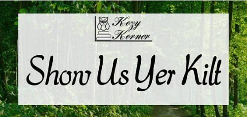 Kozy Korner candle Show Us Yer Kilt label with a background of a forest
