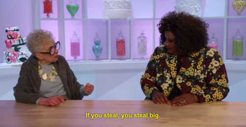 Sylvia saying that if you steal, you better steal big. She's a petite woman with giant blue framed glasses