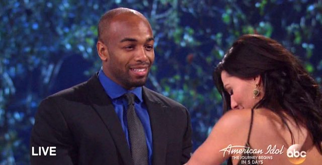 Becca and Darius smile at each other