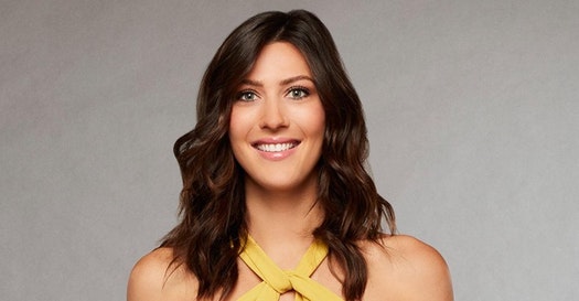 Becca smiles at the camera in a promotional head shot