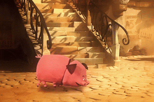 Pig from the book of life jumping nose to the camera and knocking it over like OMG WHAT YOU ARE HERE HELLO 