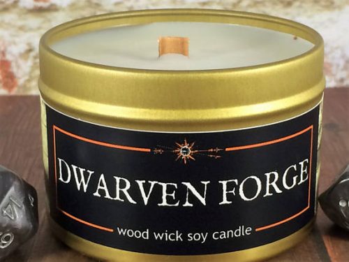 Epic Adventure Candle in Dwarven Forge scent. The candle is housed in a gold, metal jar and has a square, crackling wick.