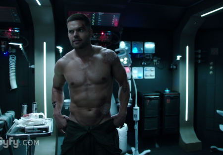 Amos has his space suit unzipped and this dude has an Adonis belt like whoa