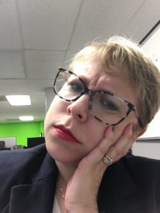 Elyse still looking confused. Her head is tilted to the right this time, hoping things might make sense from that angle.