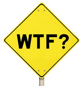 A yellow street sign that says WTF?