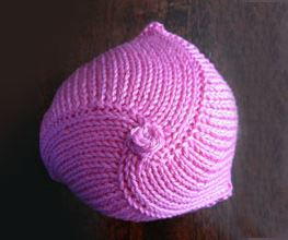 a pink knitted breast prosthesis