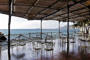 The outdoor dining area of the Carlino, the hotel seaside restaurant