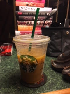 my iced coffee on the table next to me