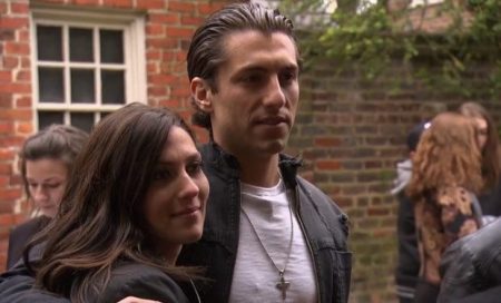 Becca and Jason stand outside the Poe museum