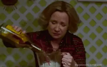 Kitty Forman pours tequila into a blender