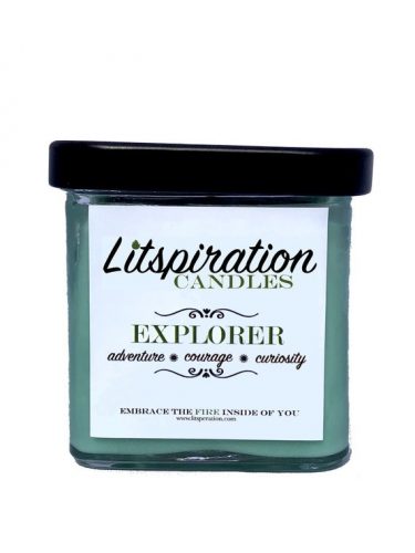 A muted green candle in a square jar. The jar has a black lid.