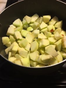 chunked apples in a pot. The wine is in there, too, but you'll have to trust me.
