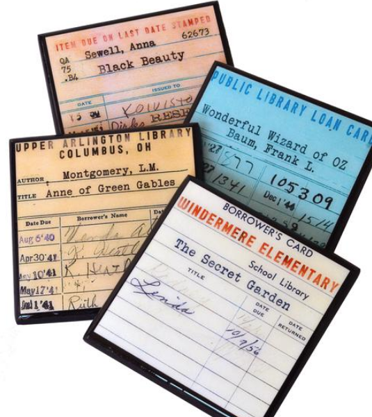Vintage Library Circulation Card coasters featuring Black Beauty, Wizard of Oz, Anne of Green Gables, and The Secret Garden