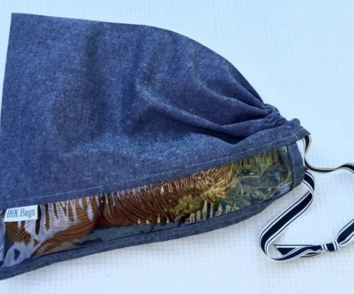 Deep blue peek a boo bag with a see through panel for knitting and projects