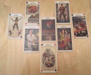 cards from the zombie deck used in a broken heart layout