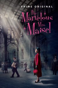 marvelous mrs maisel poster she's in a red coat in alargely black and white background wit h the light from Grand Central's ceiling isolating her in a beam 