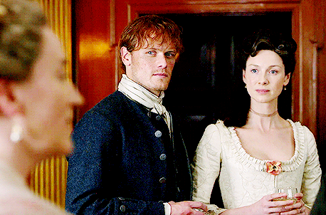 Claire and Jamie, listening to Jocasta announce Jamie as her heir.